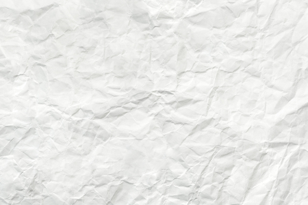 Crumpled white paper sheet, texture wrinkled backgroundの写真素材