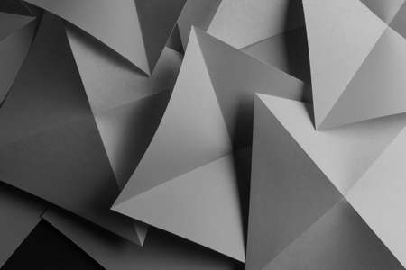 Composition with gray paper folded in geometric shapes, macro imageの写真素材
