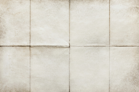 Close-up of old empty letter folded in eight, texture backgroundの写真素材