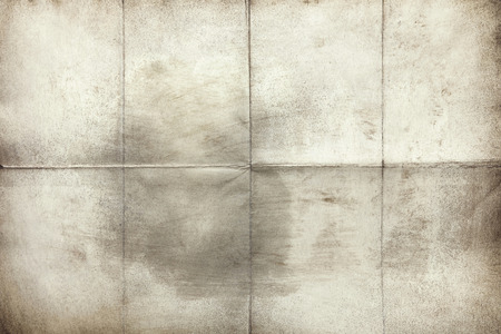 Close-up of old empty letter folded in eight, texture backgroundの写真素材