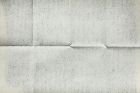 Close-up of old empty letter folded in eight, texture backgroundの写真素材