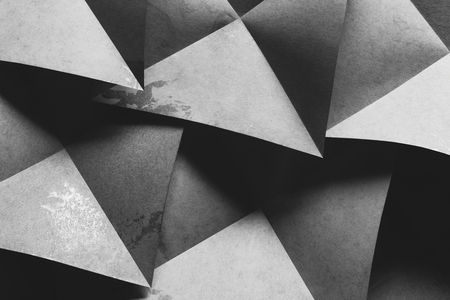 Creative image with gray paper elements for dark abstract backgroundの写真素材