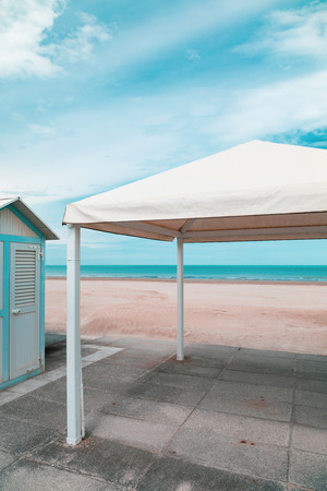 Beach with gazebo and bathing cabins, sea viewの写真素材