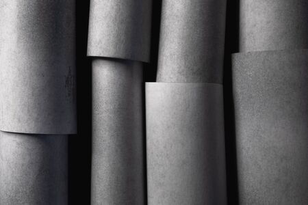 Composition with cylindrical elements, dark abstract backgroundの写真素材