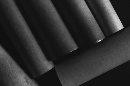Composition with cylindrical elements, dark abstract backgroundの写真素材