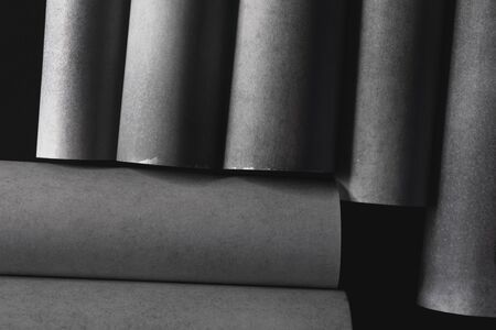 Composition with cylindrical elements, dark abstract backgroundの写真素材