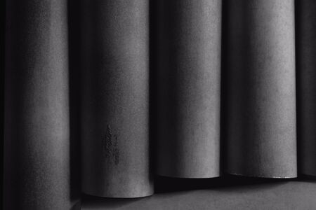 Composition with cylindrical elements, dark abstract backgroundの写真素材