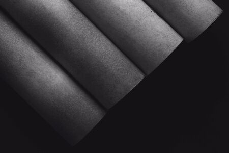 Composition with cylindrical elements, dark abstract backgroundの写真素材