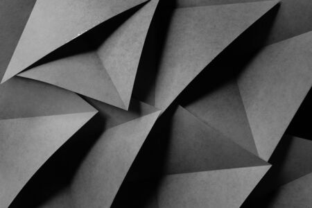 Geometric shapes of gray paper for dark background, abstractの写真素材