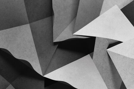 Geometric shapes of gray paper for dark background, abstractの写真素材