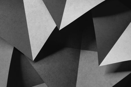Geometric shapes of gray paper for dark background, abstractの写真素材