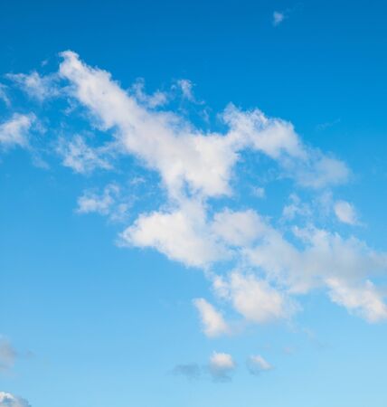 Clouds in the blue sky, natural backgroundの写真素材