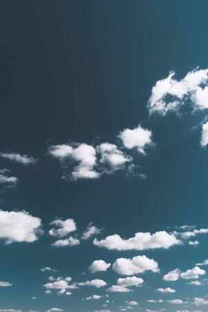 Clouds in the blue sky, natural backgroundの写真素材