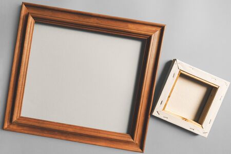 Picture frame and canvas for painting, isolated on grayの写真素材