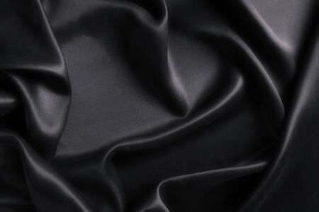 Close-up of fine black silk, texture backgroundの写真素材