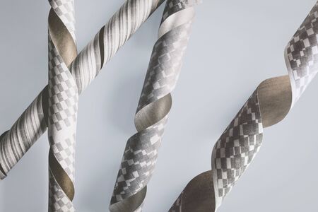 Curled decorative elements, paper texture background