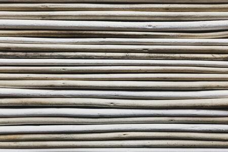 Close-up of wooden sticks in a row, backgroundの写真素材