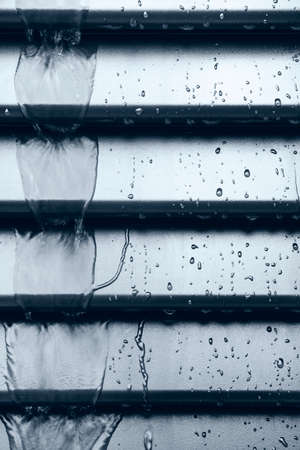 Rainy day, drip water on the shutter, detailの写真素材