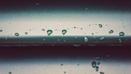 Macro of raindrops on metal surface, detailの写真素材