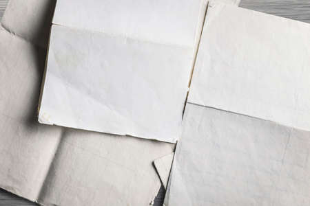 Old letters close-up, paper folded, texture backgroundの写真素材
