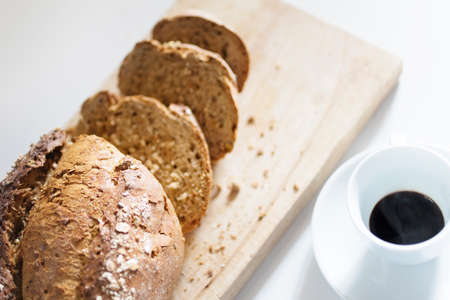 Preparation of breakfast, sliced wholemeal bread