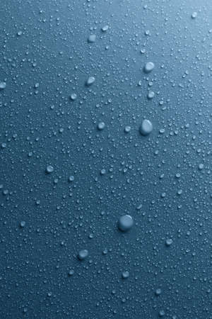 Close-up of water drops on smooth surface, backgroundの写真素材