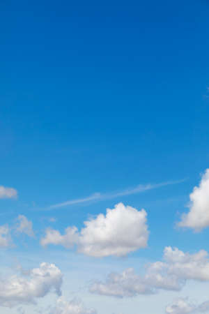 Cumulus clouds on the blue sky, natural backgroundの写真素材