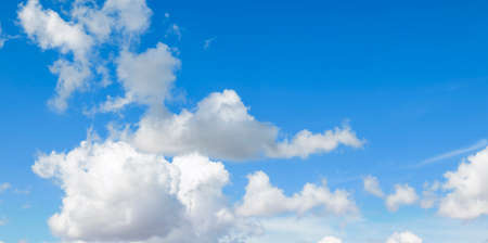 Cumulus clouds on the blue sky, natural backgroundの写真素材