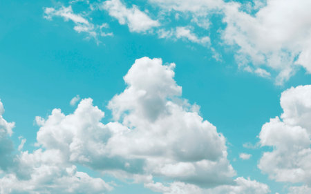 Cumulus clouds on the blue sky, natural backgroundの写真素材