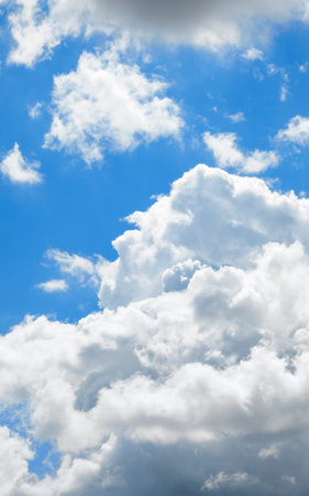 Cumulus clouds on the blue sky, natural backgroundの写真素材