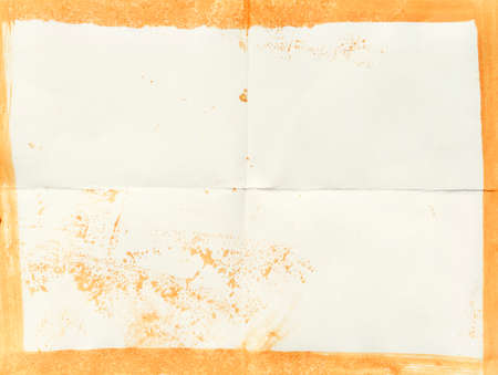 Close up of old paper sheet aged with frame, texture backgroundの写真素材