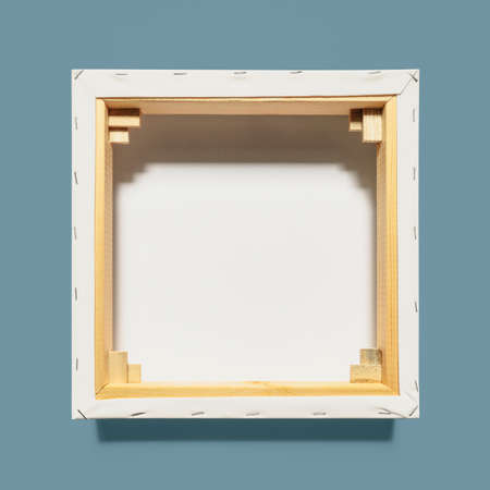 Back of canvas for painting, isolated on blue