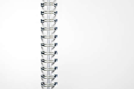 Spiral bound notepad close-up, texture backgroundの写真素材