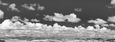 Hilly landscape in summer day. Panoramic view black and whiteの写真素材