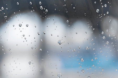 Water drops in the window glass, weatherの写真素材