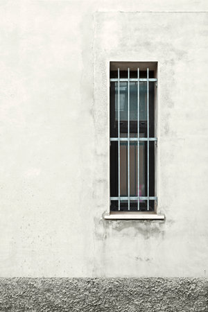 Detail old building, window with railings, front viewの写真素材