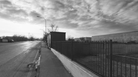 Road in an industrial area, black and whiteの写真素材