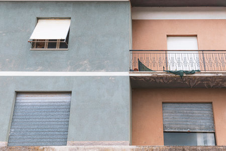 Two-tone building facade, weathered houseの写真素材