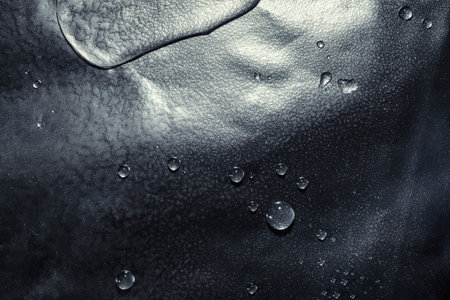 Water drops on metallic surface, texture backgroundの写真素材
