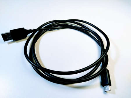 Black wired usb cable for mobile chargerの写真素材