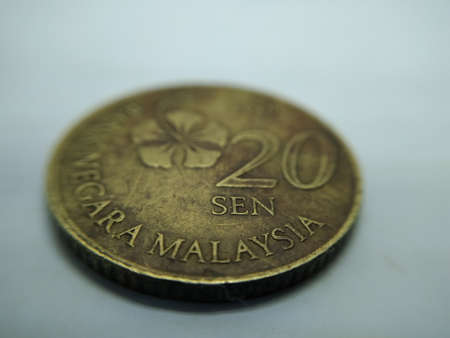 Gold coin isolated on white backgroundの写真素材