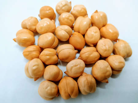 A picture of chickpeas without rind isolated on white background