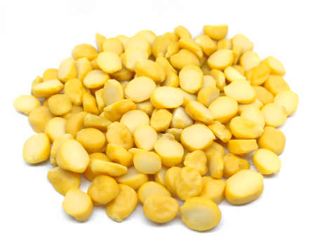 A picture of split gram lentil isolated on white backgroundの写真素材