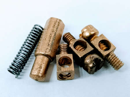 A picture of screws and spring isolated on white background