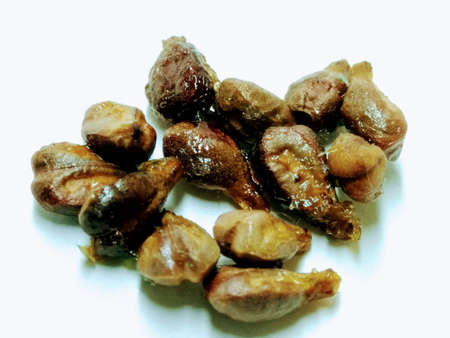 A picture of dry raisins seeds on a white background