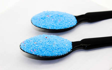 A picture of washing powder on white background