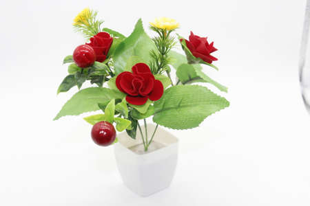 Artificial flowers isolated on white background with selective focusの写真素材