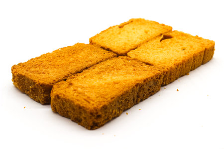 Crispy rusk on white background with selective focusの写真素材