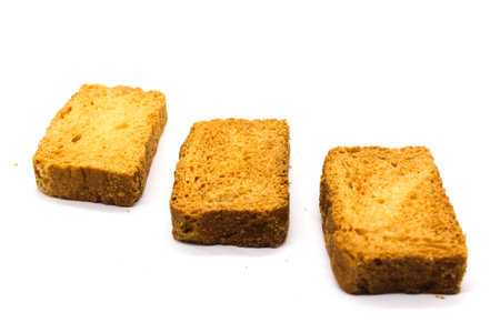 Crispy rusk on white background with selective focusの写真素材
