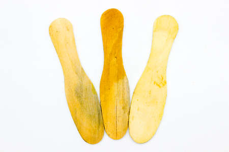 Wood spoon isolated on white background with selective focusの写真素材